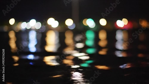 Wallpaper Mural Blurred lights and reflections on water surface at night: Colorful out-of-focus illumination Torontodigital.ca