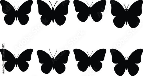 Collection of eight black butterfly silhouettes isolated on a clean white background, showcasing diverse wing shapes and sizes for graphic design.