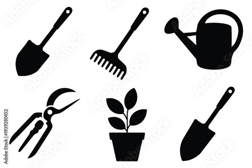 Black silhouettes of gardening tools and plant shovel 1