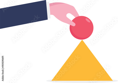 Hand Dropping Red Ball into Progress Hole