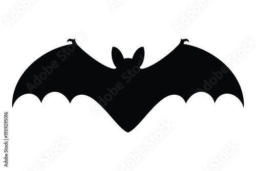 Black bat silhouette with wings spread wide