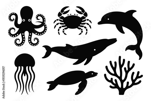 Black silhouettes of marine animals and coral octopus