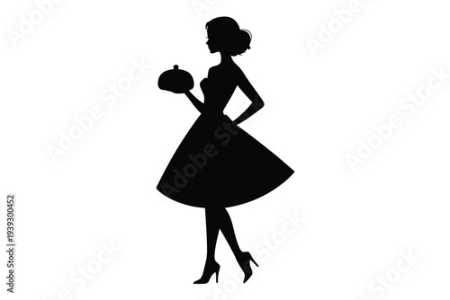 Silhouette of woman holding cake in black dress heels