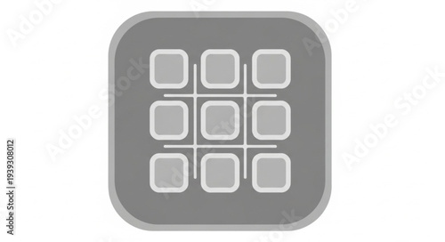 Close-up of a modern gray calculator with numeric keypad.