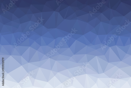 A visually appealing pattern of many blue polygons forming a gradient from dark to light shades