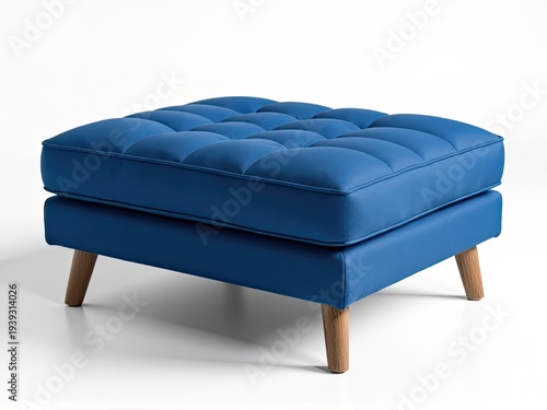 A blue ottoman with wooden legs on a white background, suitable for interior design and furniture photography