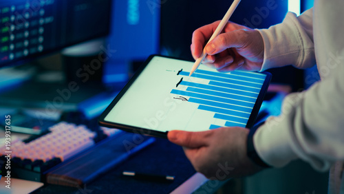 Business data analysis tablet bar chart visual notes