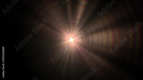 Lens flare light burst animation. Cinematic sun rays with glowing halo and optical flare effect on dark background