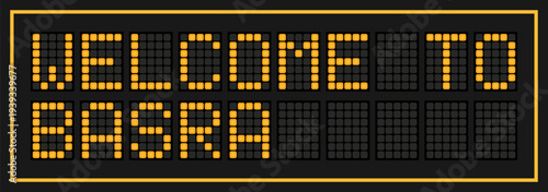 Orange color led banner in word welcome to basra on black background
