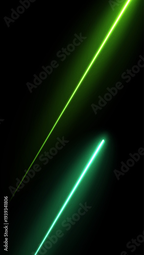 Diagonal green neon light beams glowing on dark background effect. green neon laser style light beams glowing across a dark background creating a futuristic technology themed abstract light effect wit
