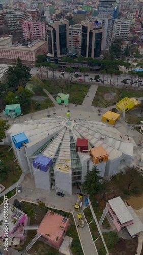 Vertical footage of an aerial drone view of buildings downtown Tirana, Albania