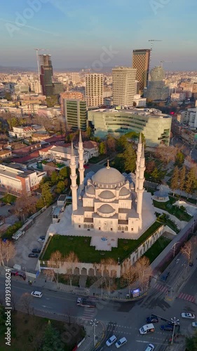Vertical footage of an aerial drone view of buildings downtown Tirana, Albania