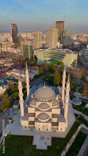Vertical footage of an aerial drone view of buildings downtown Tirana, Albania