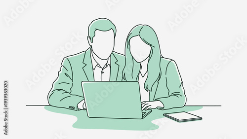 Professional business colleagues collaborating on a laptop, demonstrating teamwork and digital workspace efficiency in a modern office setting