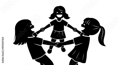 Three girls holding hands in a circle smiling and playing together in a friendly gesture of unity and friendship