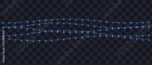 Three graceful strings of luminous blue electric lights glow in the darkness