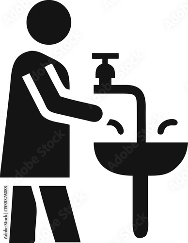 Person rinsing hands under running water from a faucet in a clean sink