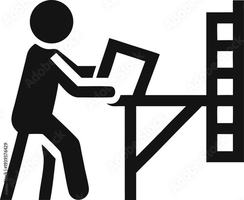 Person working intently at a drafting table creating plans or blueprints with tools