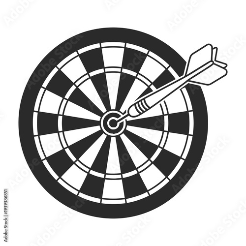 Dart strikes bullseye on black and white dartboard in close up view