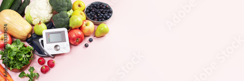 Foto Hypertension prevention banner with healthy food and blood pressure monitor, cop