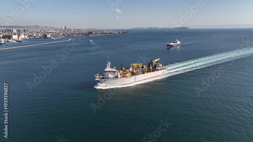 A giant ship is passing through Istanbul; aerial footage. Drone footage of the ship in the Istanbul Strait.