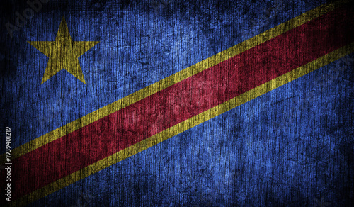 Abstract retro flag of DR Congo on a wooden background.