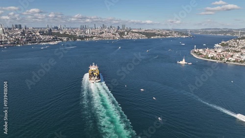 A giant ship is passing through Istanbul; aerial footage. Drone footage of the ship in the Istanbul Strait.