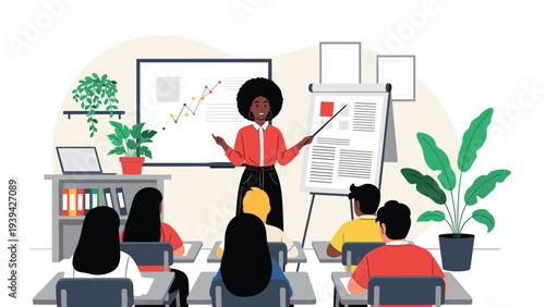 Professional black female educator giving a presentation to students in a modern classroom setting with charts and a whiteboard.