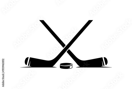 Vector illustration of crossed hockey sticks and puck