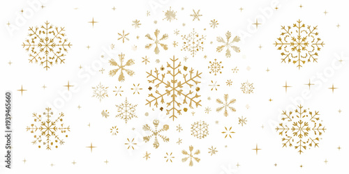 Golden snowflakes and sparkling stars on a cream background
