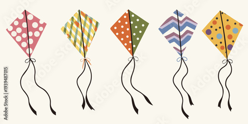 A colorful collection of patterned kites suspended on black strings