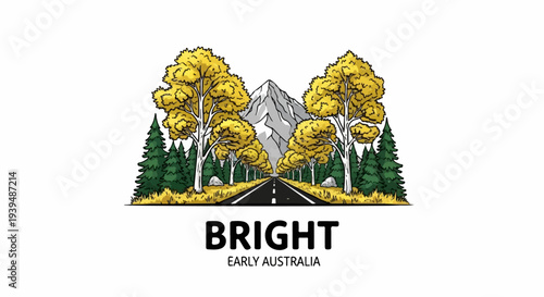 Scenic mountain road lined with golden autumn trees, leading to a peak