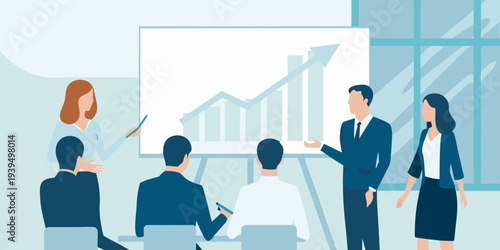 Business professionals collaborating during a presentation with a growth chart