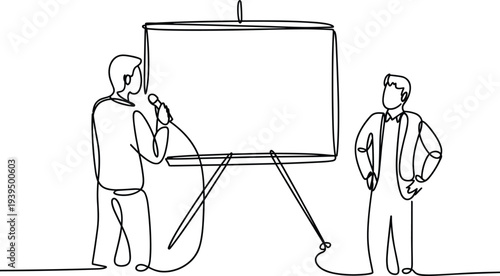 Two men standing near a whiteboard with one person holding a microphone and the other with arms crossed