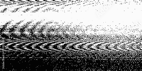 Abstract black and white image resembling ripples in water or sand