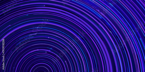 Abstract swirling lines of vibrant purple and blue light create a dynamic pattern