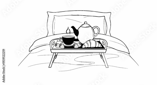 A breakfast tray with tea, croissant, and strawberries sits on a bed