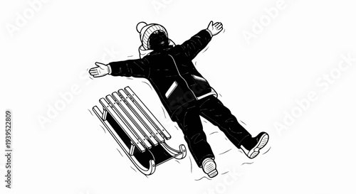 Child lying in snow next to a sled, arms outstretched