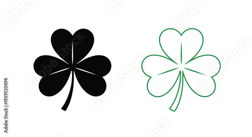 Two clovers one black and one green displayed as a silhouette