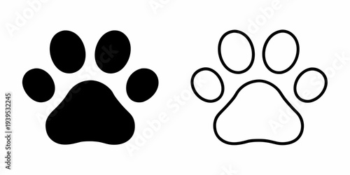 Two contrasting paw prints one black one white outline