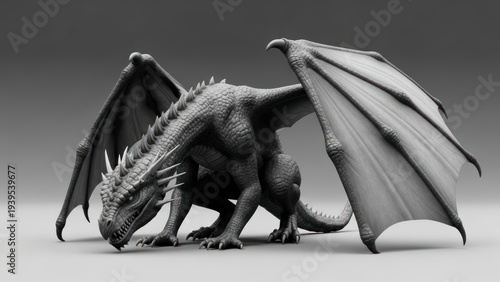 Dragon figurine with wings spread.