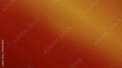 A smooth diagonal gradient transitioning from deep red to warm golden orange, creating a vibrant and abstract background.