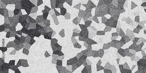 Abstract grayscale geometric mosaic pattern with granular texture and sharp edges creating a textured background for design and digital art applications
