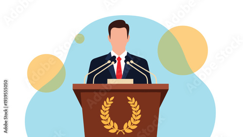 Male speaker in a business suit stands confidently at a wooden podium with two microphones giving a formal presentation to an audience.