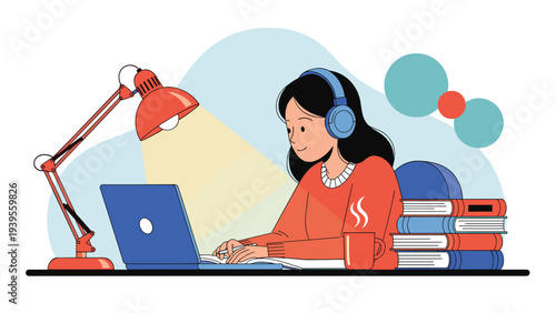 Focused young woman wearing headphones works on her laptop at a cozy desk late at night with stacks of books and a cup of coffee.