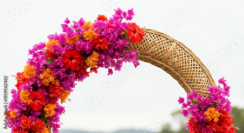 Flores de Mayo, A minimalist composition of a traditional bamboo arch (Arko) lavishly decorated with vibrant bougainvillea and hibiscus flowers