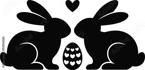 Two black silhouette bunnies facing each other with an egg and heart in between