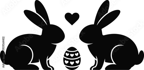 Two black silhouette rabbits in love facing each other with decorated egg between them vector