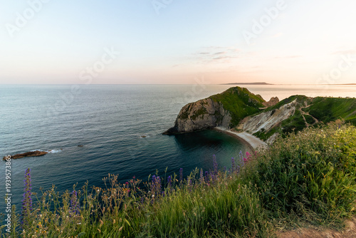 Dorset Coastline during sunset. Durdle Door, Dorset, UK