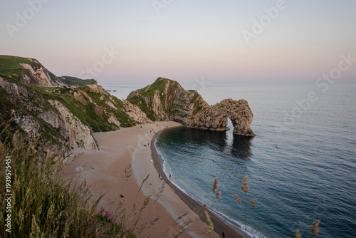 Dorset Coastline during sunset. Durdle Door, Dorset, UK
